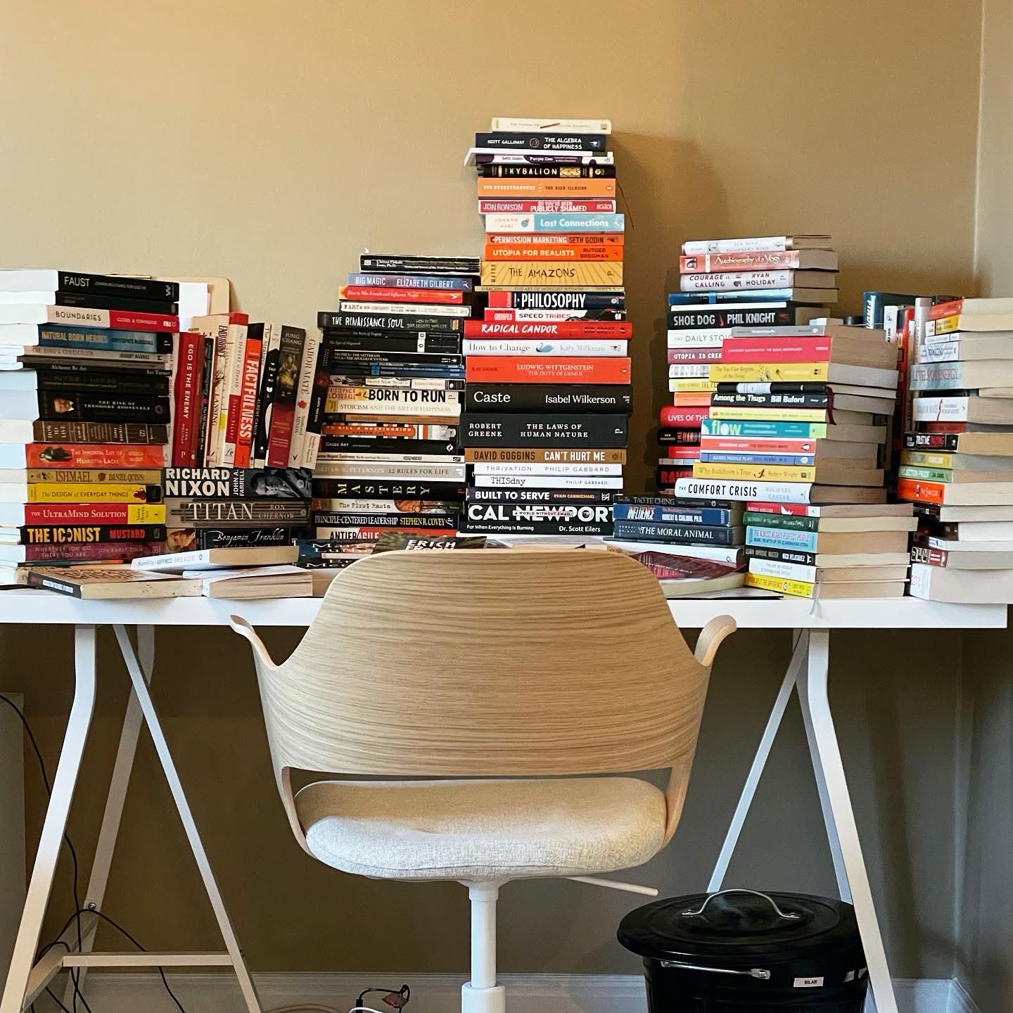 Stack of Australian non fiction books on a desk — BookLab by Bjorn