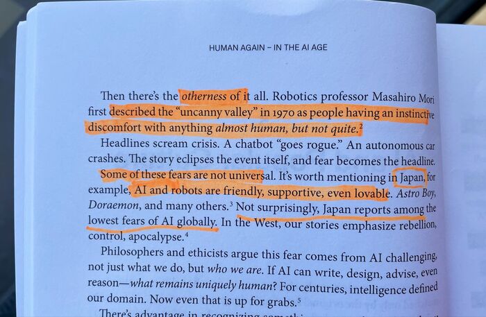 Highlighted page from Human Again on the uncanny valley and cultural attitudes toward AI